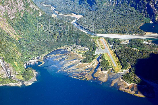 Milford Sound township aerial photo showing Bowen Falls left, Freshwater Basin, Airport, with Cleddau River and Deepwater Basin beyond, Milford Sound, Fiordland National Park, Southland District, Southland Region, New Zealand (NZ)