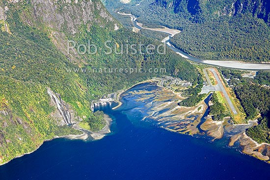 Milford Sound township aerial photo showing Bowen Falls left, Freshwater Basin, Airport, with Cleddau River and Deepwater Basin beyond, Milford Sound, Fiordland National Park, Southland District, Southland Region, New Zealand (NZ)