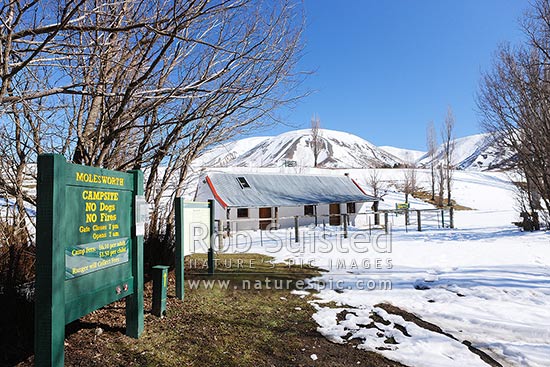 Molesworth Cob cottage Homestead, historic building in the Awatere River valley. Built in 1866 as the original Molesworth Homestead building, with winter snow, Molesworth Station, Marlborough District, Marlborough Region, New Zealand (NZ)