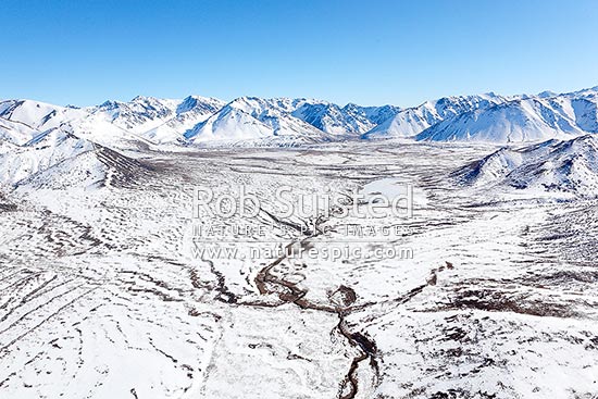 Sedgemere Tarns and Island Lake at Tarndale in winter snow. Turk Ridge, Mt Weld (2114m), Wairau River valley, No Mans Creek and Stafford Ridge beyond. Aerial, Molesworth Station, Marlborough District, Marlborough Region, New Zealand (NZ)